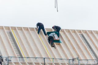 Rénovation d'une toiture avec pose de Velux à La Chaux-de-Fonds au restaurant Le Siam